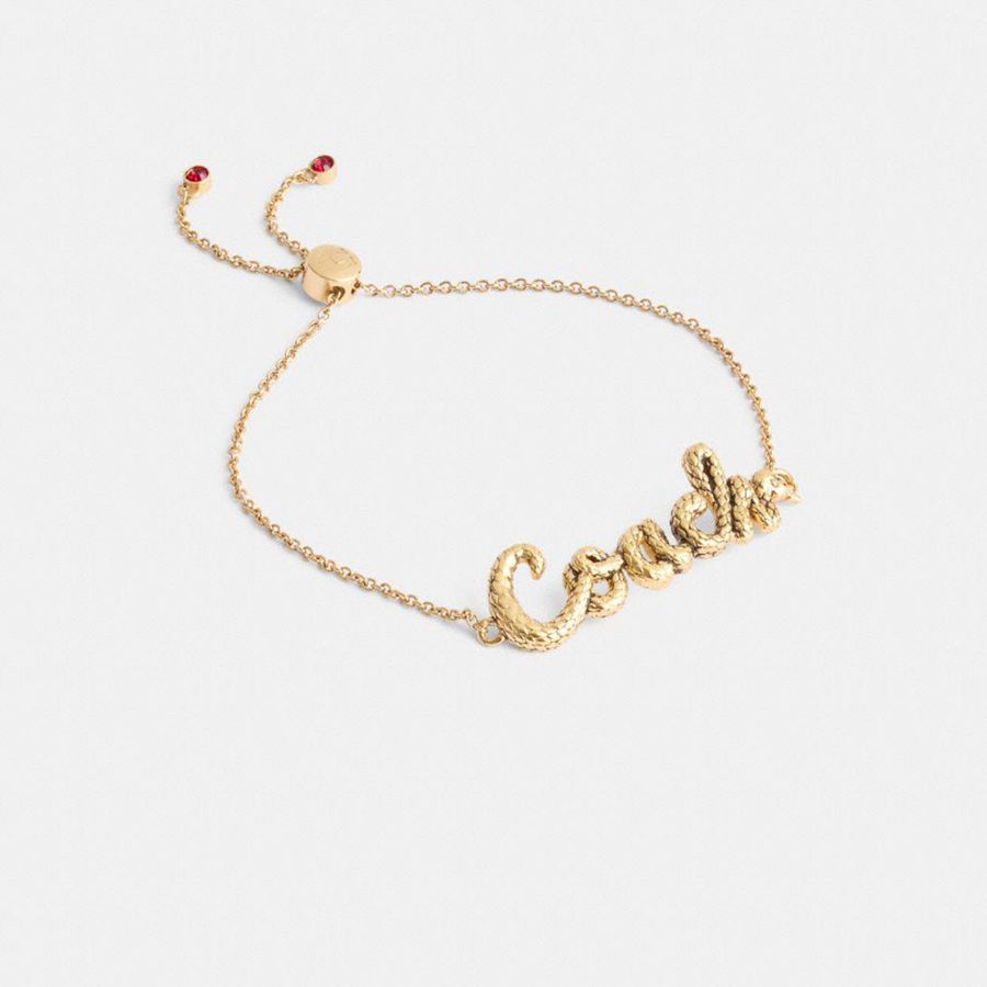 Joyería COACH New Year Coach Snake Script Slider Bracelet Mujer Doradas | CRV-914825